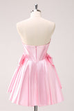 Vestido de fiesta corto con escote en A sin tirantes y corsé en color rosa con lazos