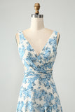 Vestido de invitada de boda con volantes de flor azul blanca una línea alta y baja