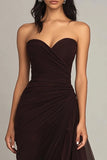 Vestido negro con volantes fruncidos
