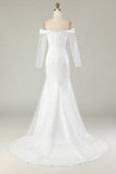 Vestido de novia de satén mate con hombros descubiertos marfil
