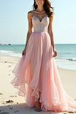 Vestido largo de invitada de boda de tul con tirantes de espagueti y volantes