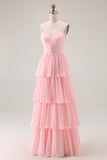 Tirantes de espagueti rosa caramelo Un vestido largo de dama de honor con volantes