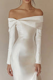 Vestido de novia sirena blanco con hombros descubiertos y manga larga