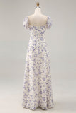 Vestido largo de invitada de boda con flores azules estampadas en línea A con abertura