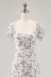 Vestido largo de invitada de boda con flores azules estampadas en línea A con abertura
