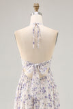 Vestido largo de invitada a boda con falda azul fruncido floral