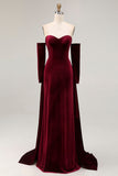 Vestido largo de terciopelo rojo oscuro con mangas largas
