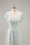 Vestido largo de dama de honor con volantes de gasa floral azul con abertura