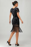 Vestido de lentejuelas doradas negras de los años 20 con flecos