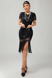 Vestido de lentejuelas doradas negras de los años 20 con flecos