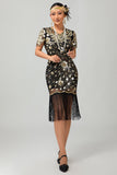 Vestido de lentejuelas doradas negras de los años 20 con flecos