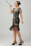 Vestido de lentejuelas doradas negras de los años 20 con flecos