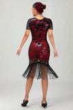 Vestido de lentejuelas doradas negras de los años 20 con flecos
