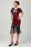 Vestido flapper de lentejuelas con flecos rojos negros de los años 20