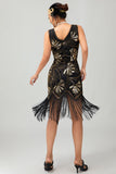 Vestido negro brillante con flecos dorados de la década de 1920