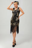 Vestido negro brillante con flecos dorados de la década de 1920