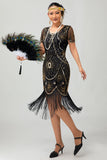 Vestido ajustado con flecos dorados y cuentas de la década de 1920