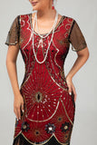 Vestido ajustado con flecos dorados y cuentas de la década de 1920