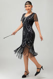 Vestido ajustado con flecos dorados y cuentas de la década de 1920