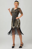 Vestido flapper ajustado de lentejuelas doradas negras de los años 20 con borlas