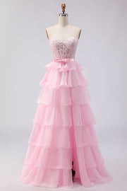 Vestido de graduación largo de corsé rosa sin tirantes con cuentas y abertura