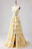 Corsé amarillo sin tirantes de línea A, corpiño floral y vestido largo de graduación con falda de gasa con volantes