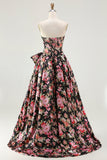 Vestido largo de graduación floral sin tirantes negro rosa con lazos