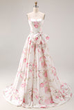 Vestido largo de graduación floral sin tirantes negro rosa con lazos