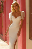 Vestido de novia de manga abullonada de sirena marfil con abertura