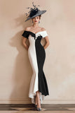 Vestido largo de sirena en blanco y negro con volantes y hombros descubiertos de la madre de la novia