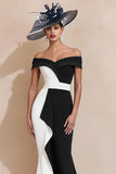 Vestido de sirena blanco y negro con hombros descubiertos de la madre de la novia