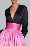 Vestido formal negro y fucsia con cuello en V y manga larga