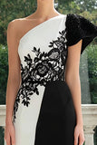 Vestido formal con apliques en blanco y negro de un hombro