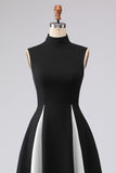 Elegante vestido formal largo de cuello alto en blanco y negro