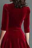 Vestido de trabajo de terciopelo burdeos con cuello en V y mangas medias