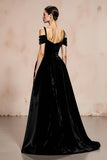 Vestido largo formal de terciopelo negro con hombros descubiertos