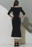 Vestido formal de terciopelo negro con longitud de té y encaje