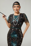 Vestido negro brillante con flecos azules de la década de 1920 con mangas cortas