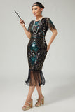 Vestido negro brillante con flecos azules de la década de 1920 con mangas cortas