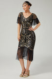 Vestido negro dorado con cuello en V de la década de 1920 con lentejuelas y flecos