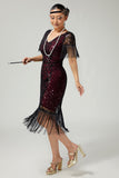 Vestido negro dorado con cuello en V de la década de 1920 con lentejuelas y flecos