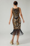 Vestido negro dorado de lentejuelas de la década de 1920 con flecos