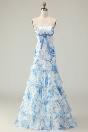 Vestido largo de fiesta con estampado de capas y sirena sin tirantes con flores azules blancas y volantes