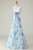 Vestido largo de fiesta con estampado de capas y sirena sin tirantes con flores azules blancas y volantes