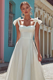 Vestido de novia midi de línea A con tirantes finos blancos con lazo