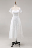 Vestido de novia midi de encaje marfil con mangas cortas