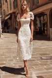 Vestido de novia midi de encaje marfil con mangas cortas
