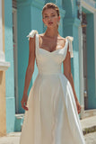 Vestido de novia blanco con tirantes finos de satén en línea A