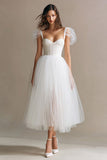 Vestido de recepción de boda de tul con corsé blanco en línea A