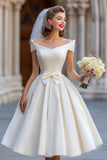 Vestido corto de novia marfil con lazo de Shouder